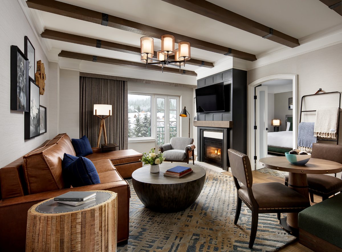 Fairmont Chateau Whistler Gold Floor - Executive Suite living room with leather sofa and fireplace